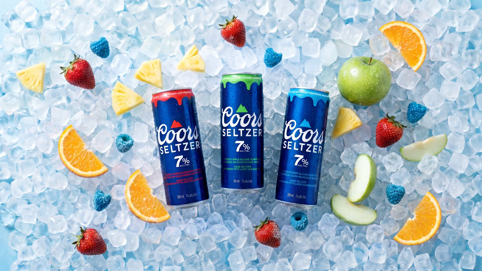 Three Coors Seltzer flavours displayed on ice with fruit