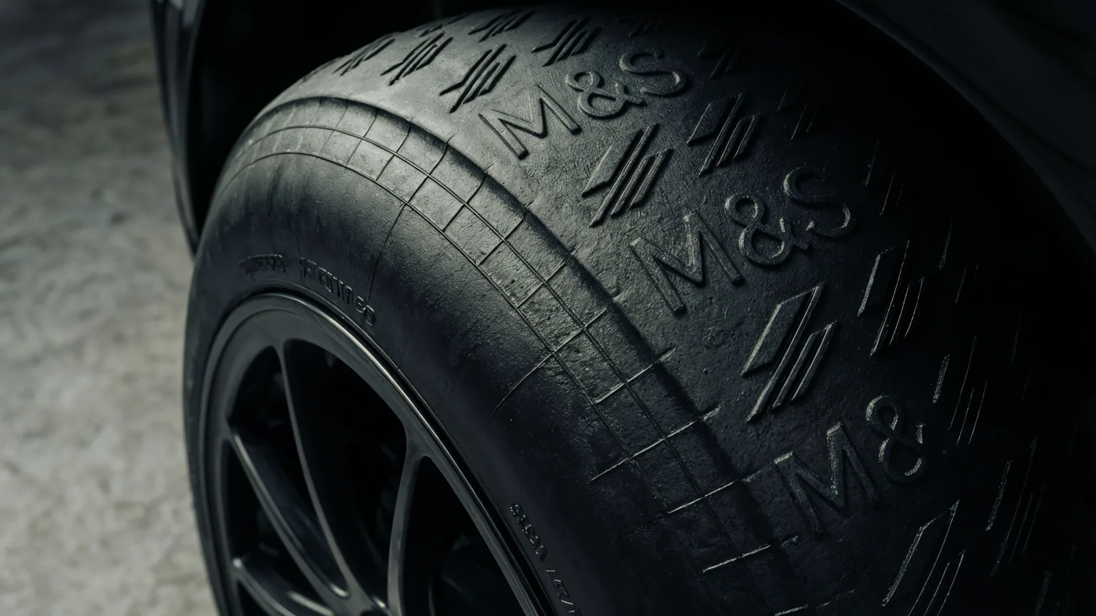 Racing tyre branded with Marks and Spencer and Silverstone Circuit campaign marks