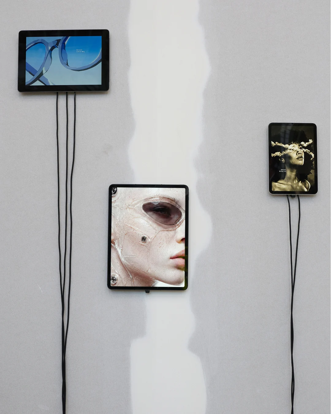 Studio Sophie Hospes's Impossible Frames portrait displayed on a screen among other artworks in the Ray-Ban exhibition at Art Basel Paris